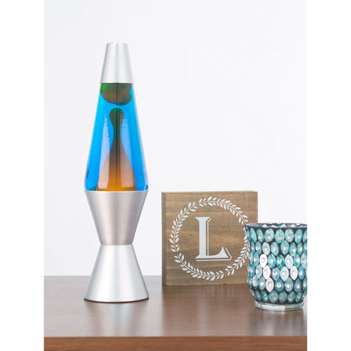 14.5" LAVA� Lamp - Orange/Blue/Silver on shelf with candle and sign