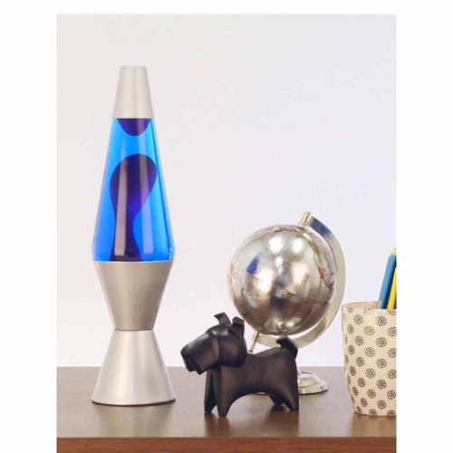 14.5" LAVA� Lamp - Purple/Blue/Silver on table with scotty dog figure, silver globe, and a pencil cup